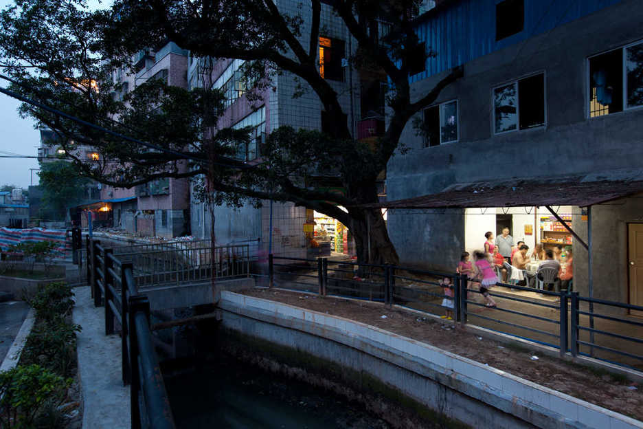 An eatery is aglow in an older community in east Tianhe district, Guangzhou.