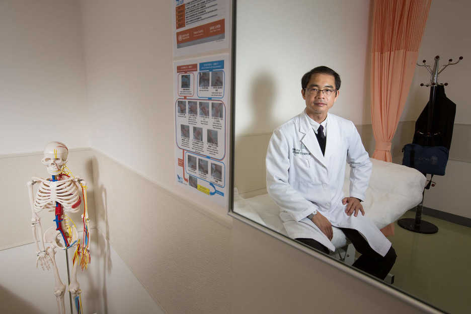 Man Hong Ming, doctor of orthopedic surgery and sports medicine, poses at the University Hospital at  the Macau University of Science and Technology (MUST) in Macau, China.