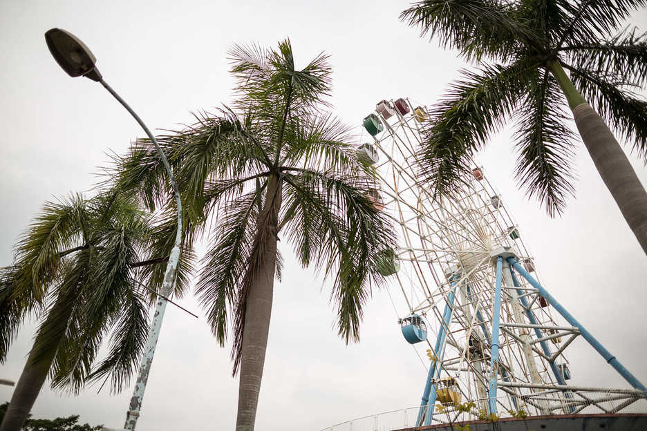 An disused Ferris wheel sits at the Honey Lake amusement park in Shenzhen, China