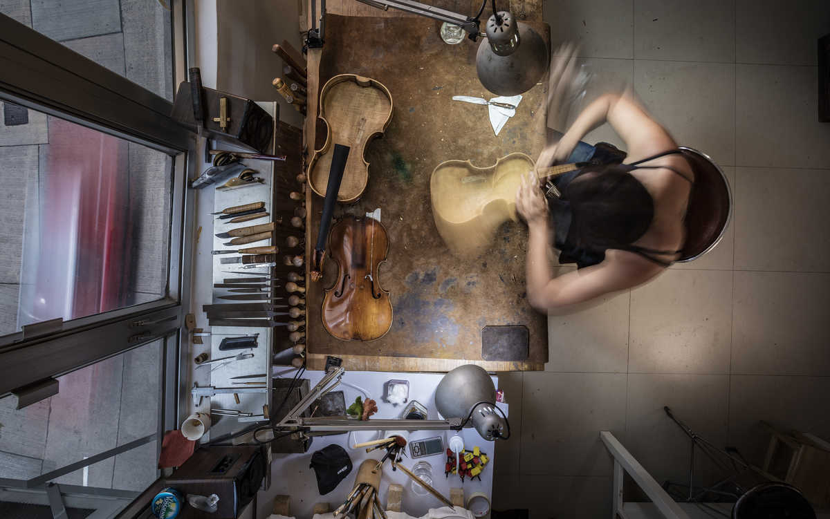 Still frame from a video production in Hong Kong featuring the violin maker Céline Garnier.