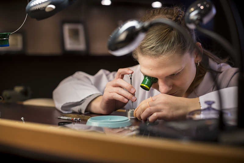 Watch technician, Macau, China.