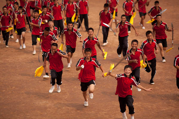 Kung Fu students train at Shaolin Si in Dengfeng, Henan province, China.