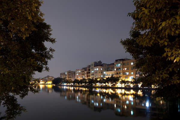 Cencun village is illuminated at night in Tianhe District