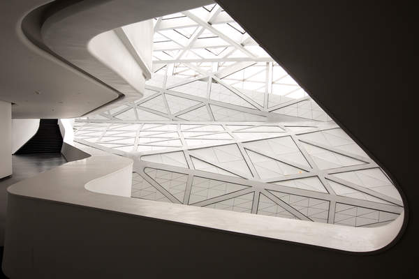 Architectural interior of the Guangzhou Opera House in Tianhe, Guangzhou, China.