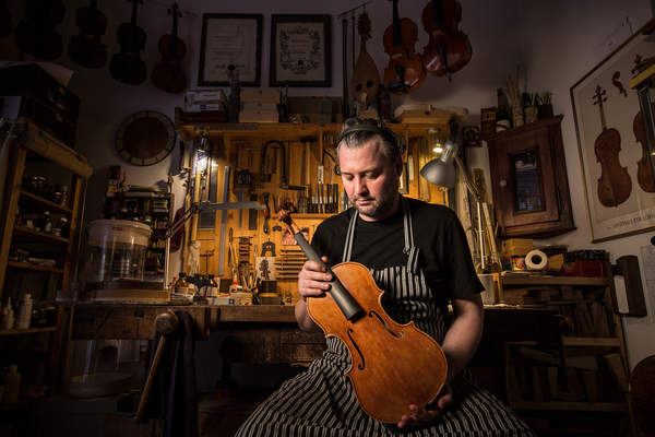 Violin maker Adonyi Ivan poses in Budapest Hungary