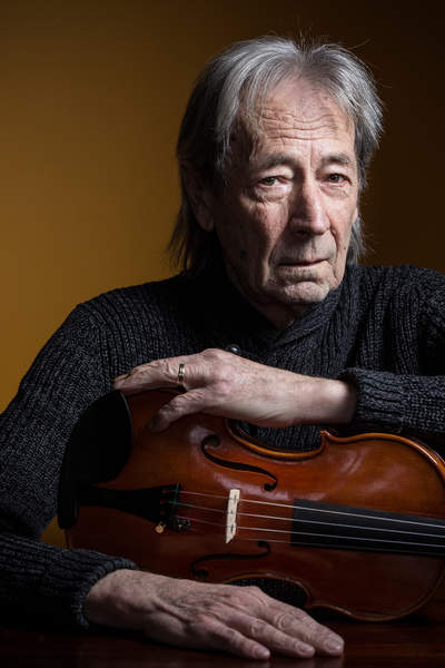 Violin maker Slavko Domitrovic poses at his home in Sisak, Croatia.