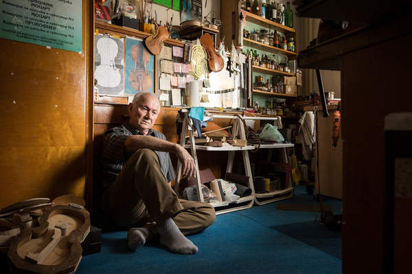 Violin maker Jan Majersky poses at his home workshop in Bratislava, Slovakia