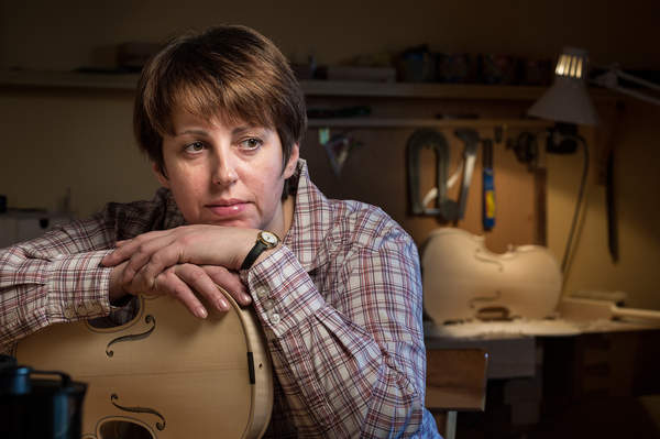 Violin maker Danuta Pawlikowska poses at her workshop