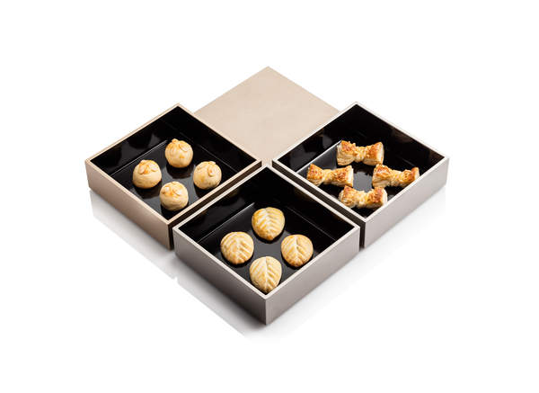 Pastries in nesting boxes