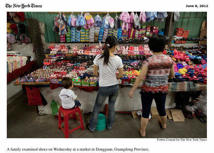 People shop for shoes in Qingxi, Dongguan, Guangdong Province, China