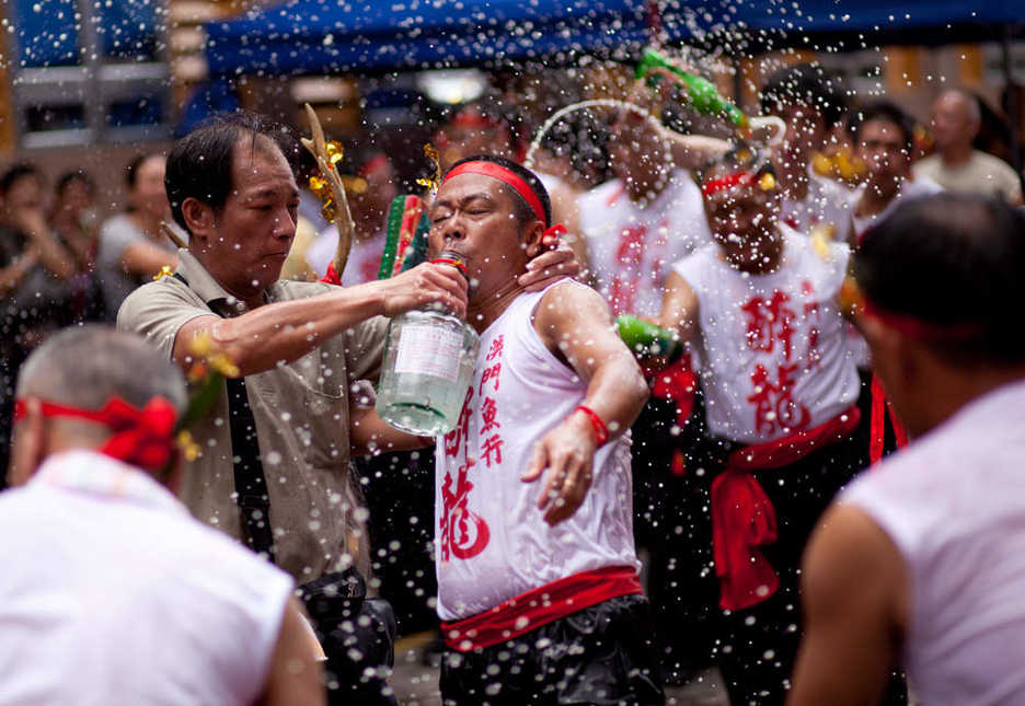 A profusion of beer and other alcohol is strewn in the air