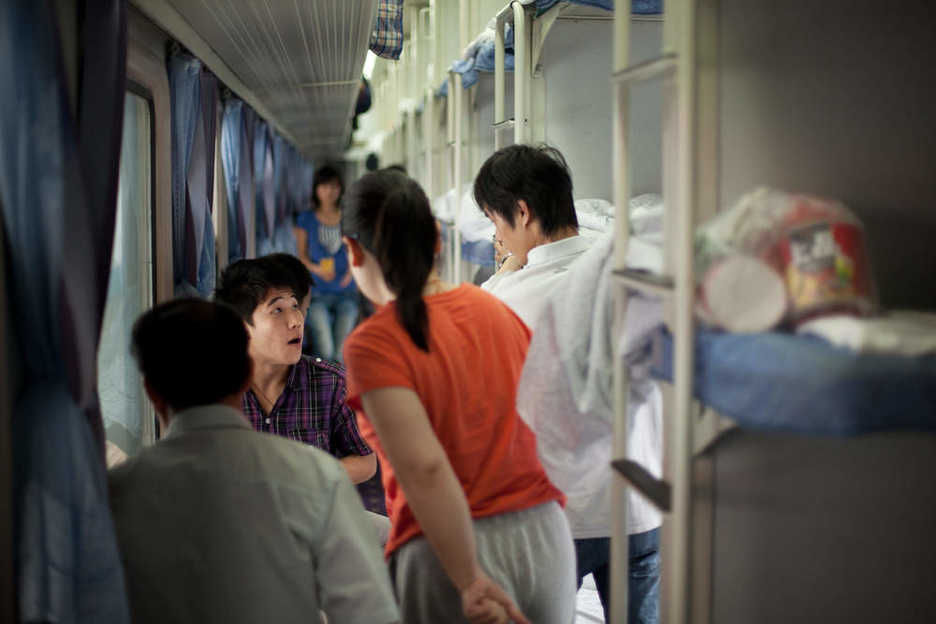 Crowded corridor aboard a train from Guangzhou to Zhengzhou, China.