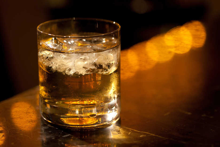 A glass of whisky on the bar at Cafe Deco in the Venetian Macau