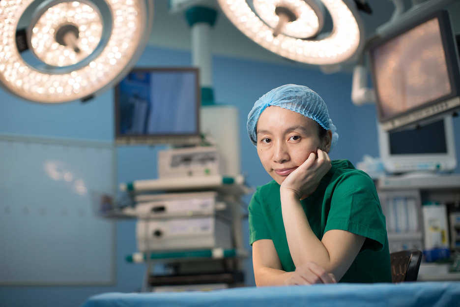 Dr. Yan Min, gynecologist at the Macau University of Science and Technology hospital, poses in Macau, China.