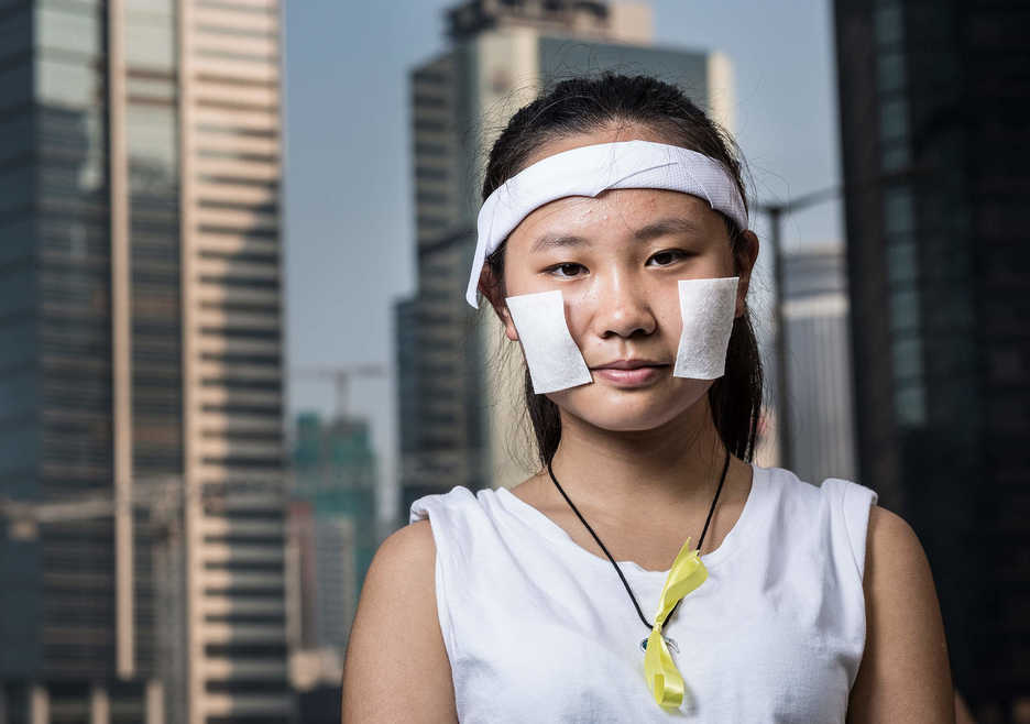 Pro-democracy protester poses in Central, Hong Kong