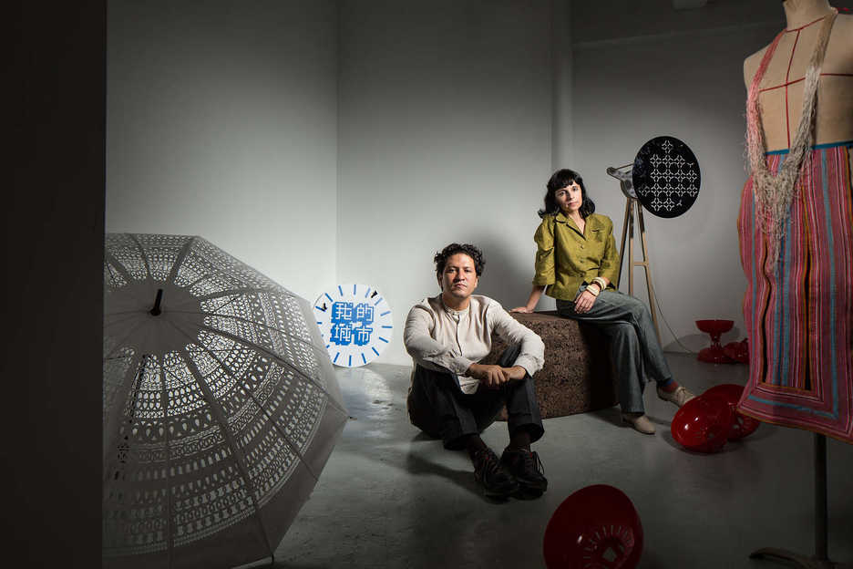 Manuel CS and Clara Brito pose in a art studio space in Macau