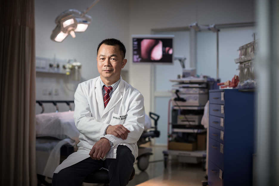 Wei Xue Jun, ear, nose and throat doctor at the Macau University of Science and Technology Hospital, poses in Macau