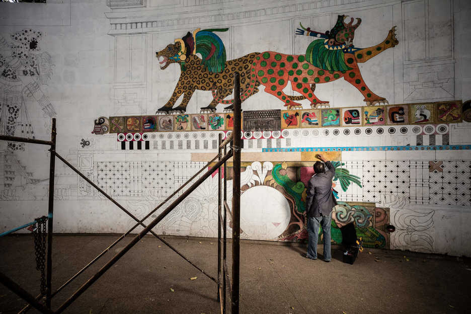 Ricardo De Morales Castello works on a mural in Mexico City