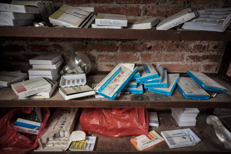 Medication is kept at a farm growing fish and pigs in south China
