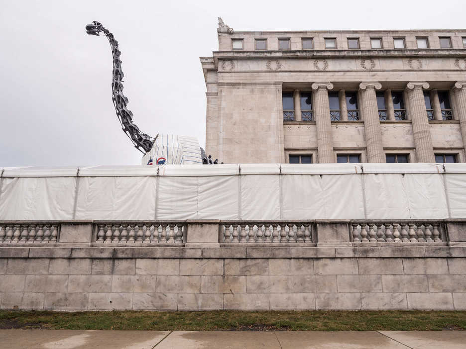 A dinosaur wears a Cubs jersey outside The Field Museum in Chicago