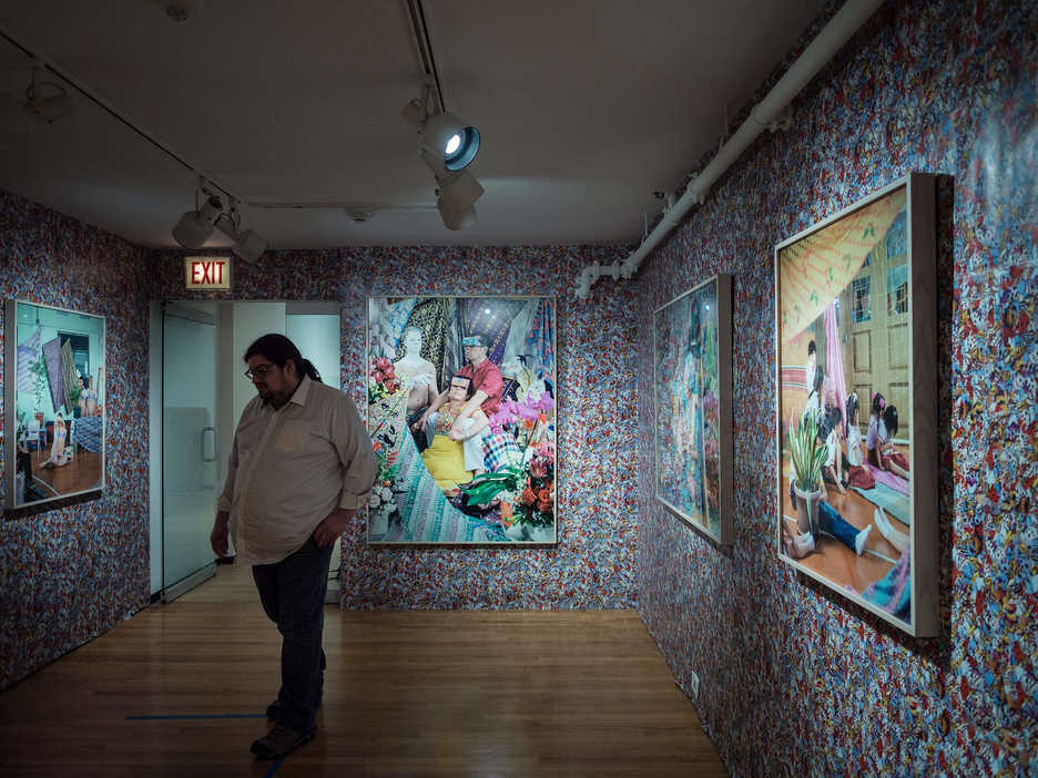 Jonathan Castillo views an art installation