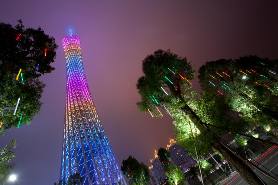 Canton tower is illuminated from ground level in Guangzhou, China