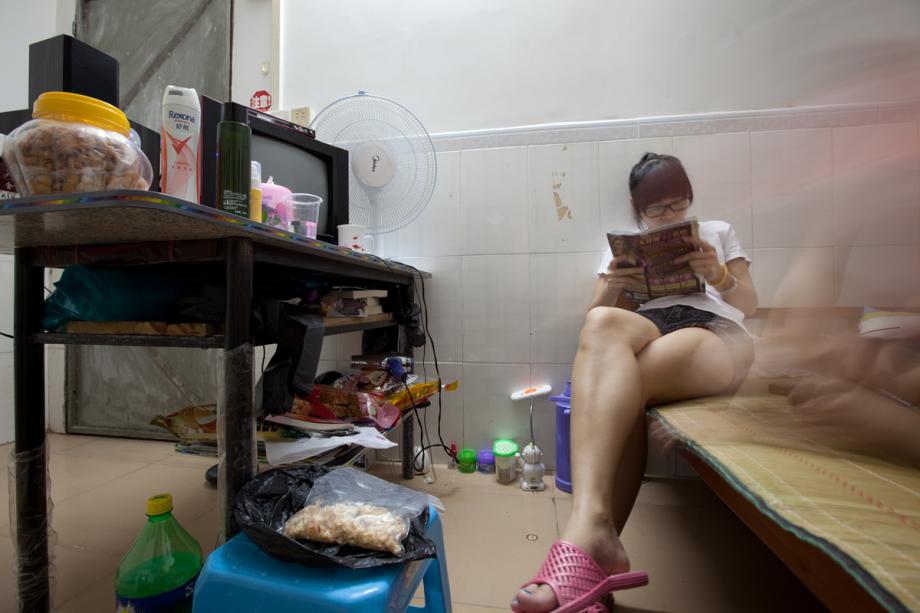 Women relax at an apartment in Cencun, Tianhe District, Guangzhou, China
