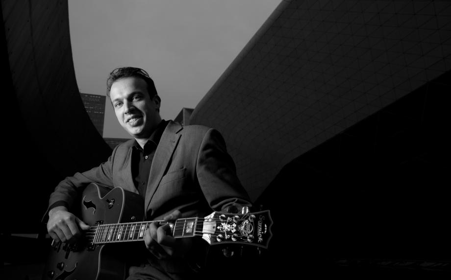 Jazz guitarist Thomas Hoogland poses at the Guangzhou Opera House.