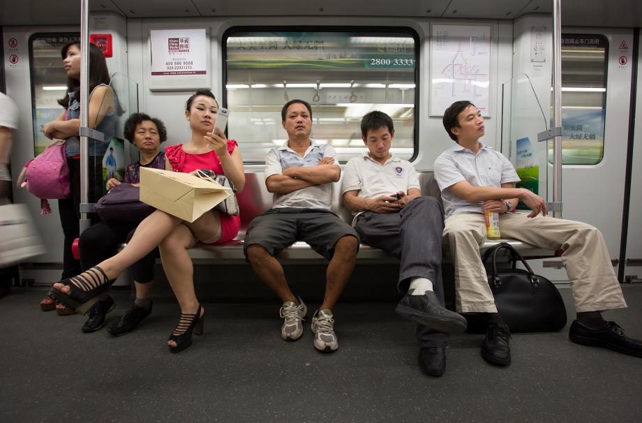 People ride the Guangzhou Metro subway system in Guangzhou, China.