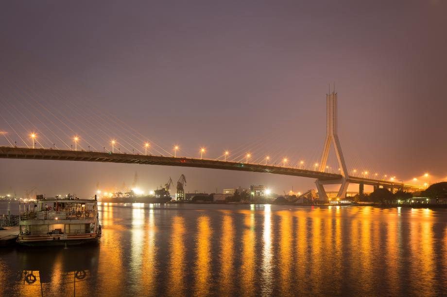 A ferry sits near the Hedong Bridge in Liwan, Guangzhou, China.