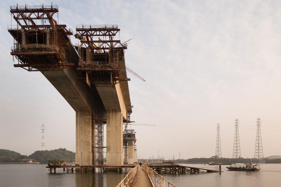 A bridge is under construction on the Pearl River in near Huangpu Village