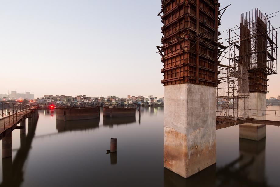 A bridge project on the Zhujiang River nears the shore in Haizhu, Guangzhou