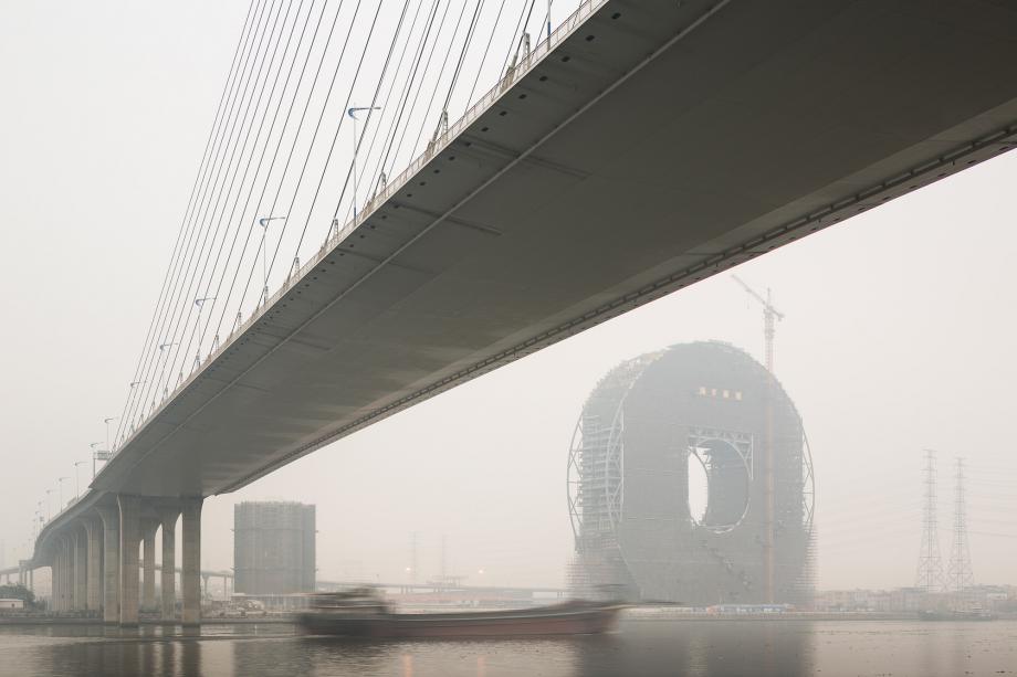 A cargo ship passes along the Pearl River in Guangzhou