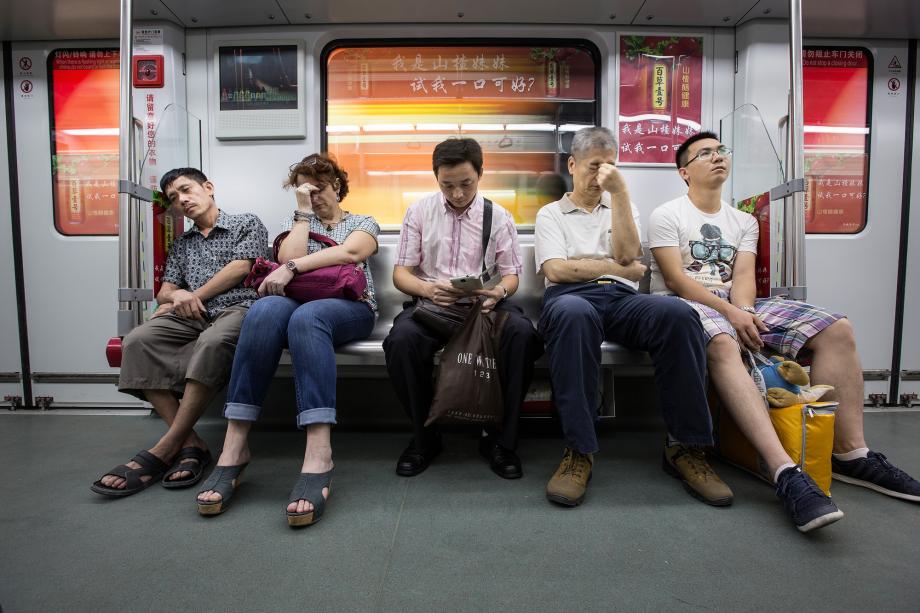 People ride line 2 of the Guangzhou Metro system